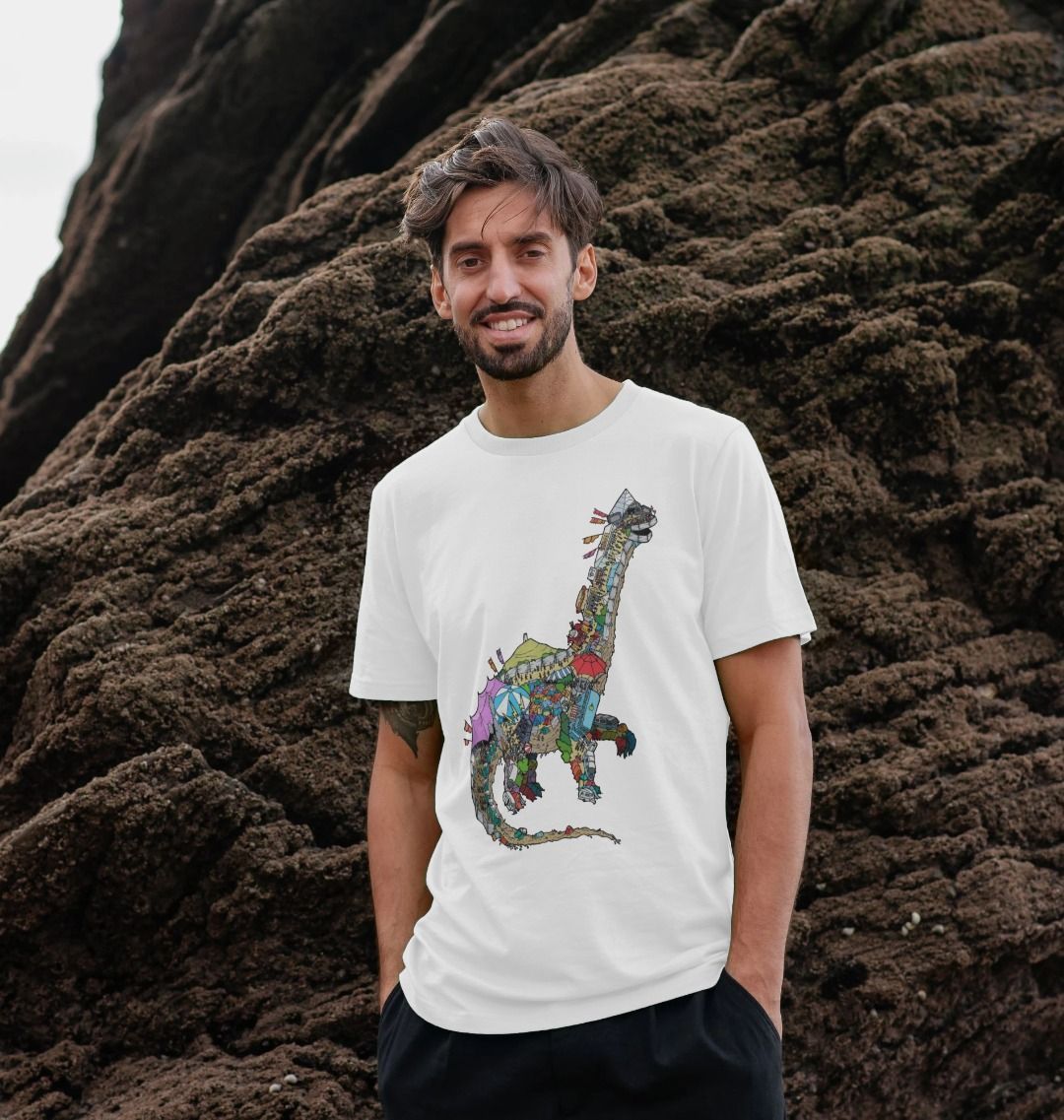 Man wearing a white Glastosaur graphic T-shirt